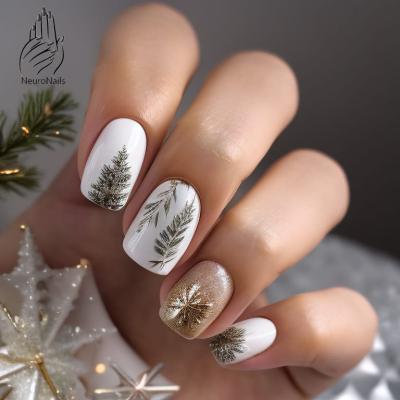 Winter nail design with Christmas trees on the nails