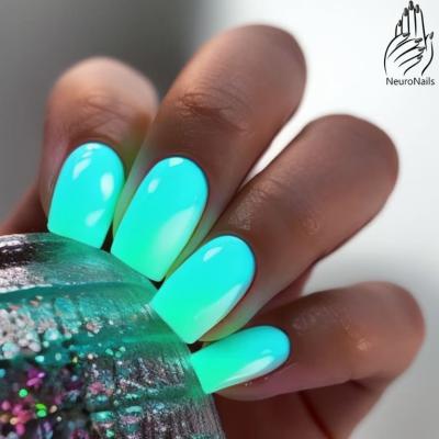 Bright neon nail design in green and blue tones