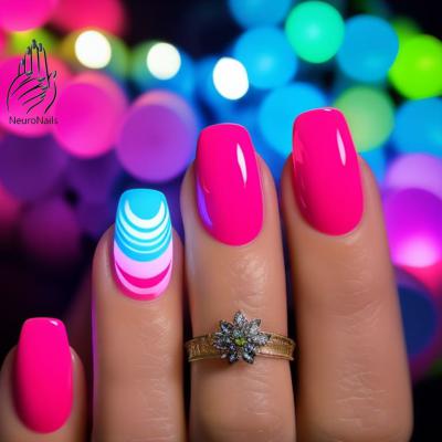 Neon nail design in red tones with a pattern on one of the nails