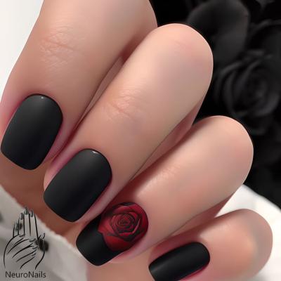 Черный матовый дизайн ногтей с изображением красной розы